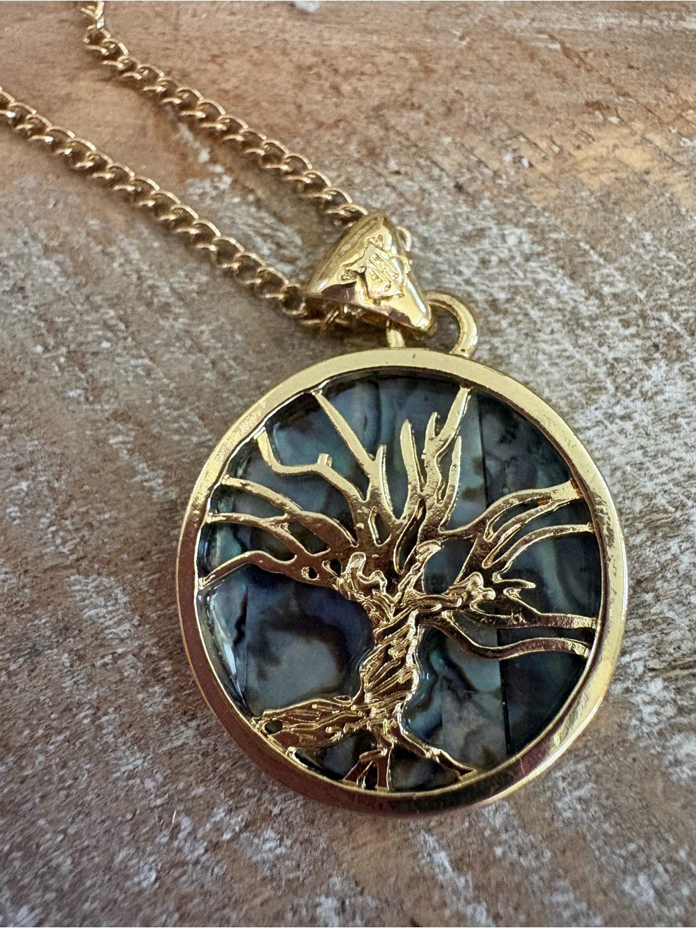 Official Warner Bros licensed Tree of Life necklace on Abalone